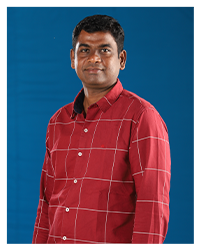Mr. Maria Joseph Ponraj, a member of the faculty, portrayed in a professional photograph.