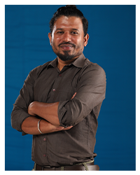 Mr. Suraj D, a faculty member, captured in a professional portrait.
